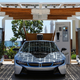 Illustration for article titled BMWs Solar-Powered Carport Is A Carbon Fiber And Bamboo Ecosculpture